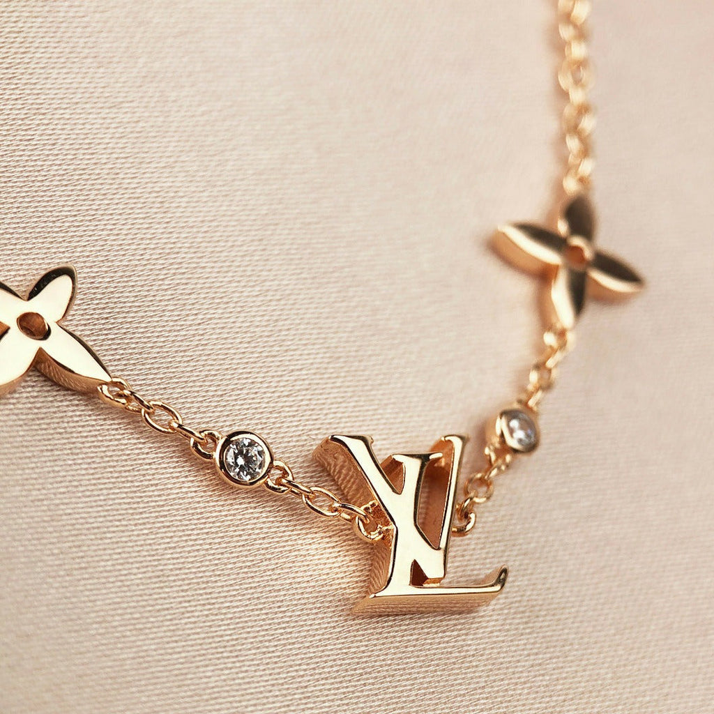 ¡®Star¡¯STAR AND SUN 7 MOTIFS GOLD BRACELET