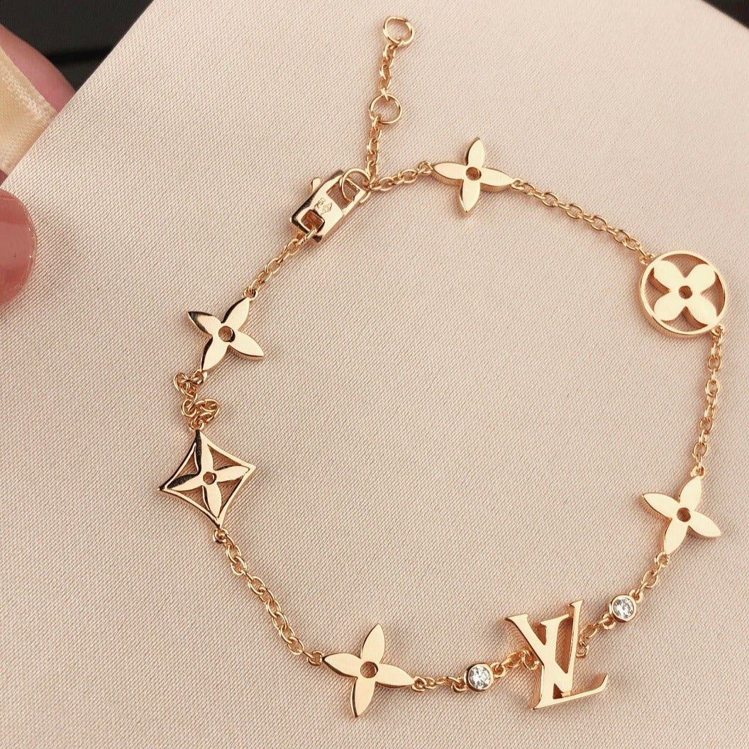 ¡®Star¡¯STAR AND SUN 7 MOTIFS GOLD BRACELET