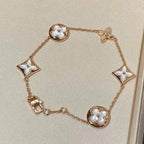 ¡®Star¡¯STAR AND SUN 5 MOTIF MOP PINK GOLD BRACELET