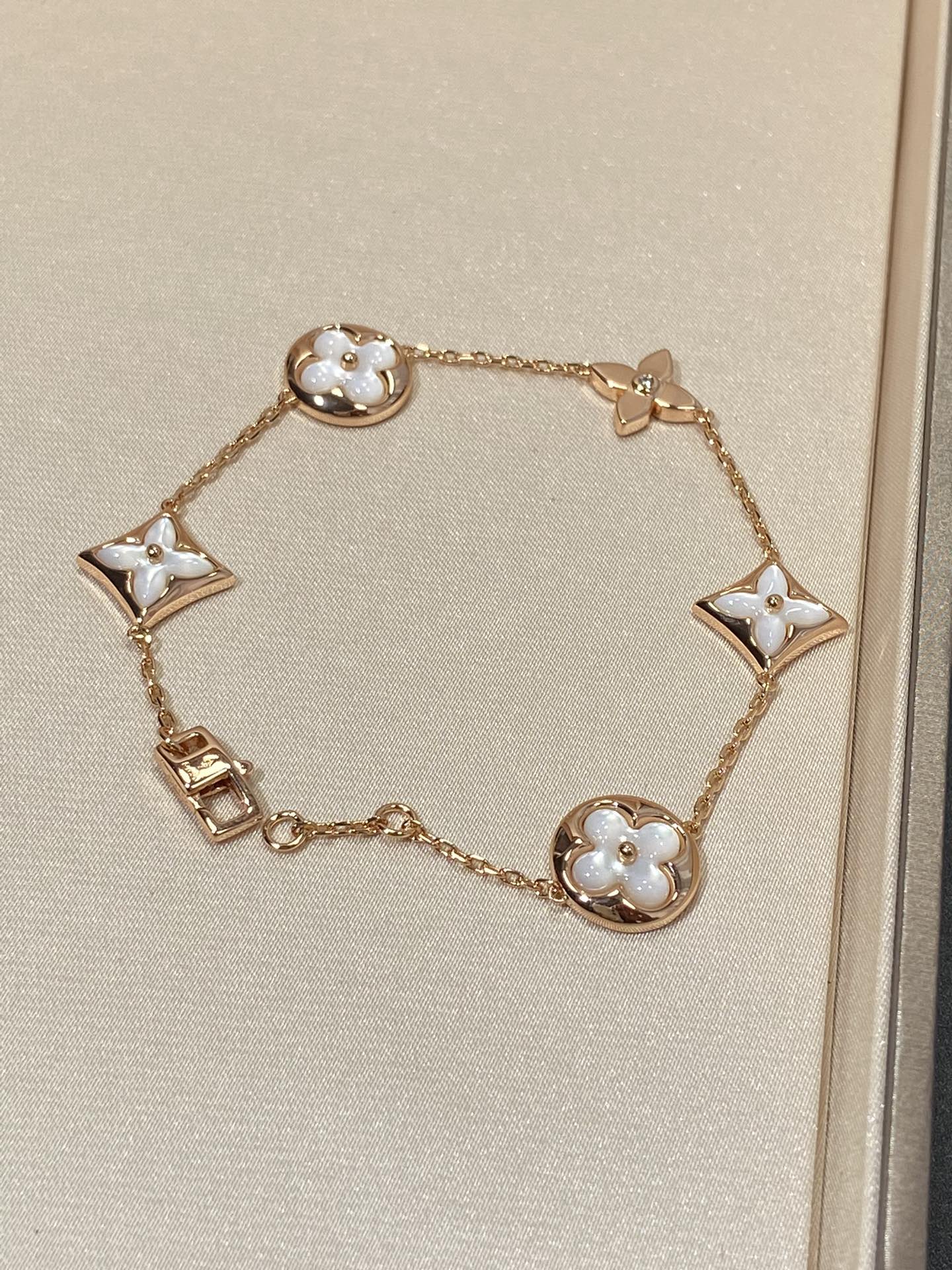 ¡®Star¡¯STAR AND SUN 5 MOTIF MOP PINK GOLD BRACELET