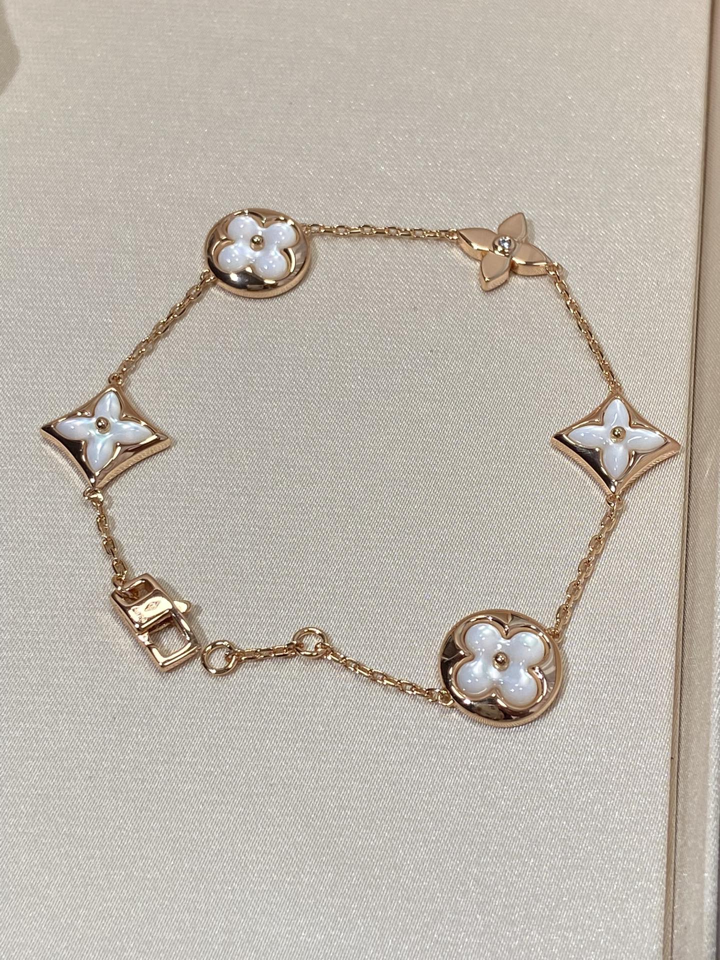 ¡®Star¡¯STAR AND SUN 5 MOTIF MOP PINK GOLD BRACELET