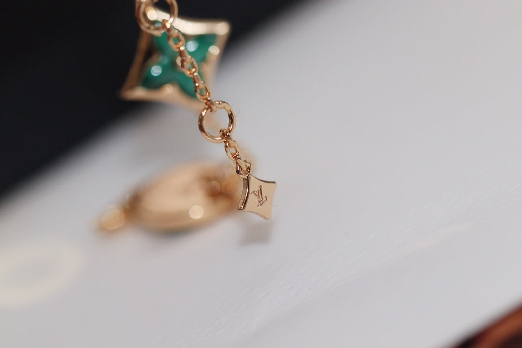 ¡®Star¡¯STAR AND SUN 4 MOTIF PINK GOLD MALACHITE BRACELET