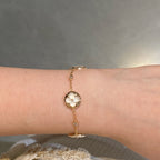 ¡®Star¡¯STAR AND SUN 4 MOTIF WHITE MOP PINK GOLD BRACELET