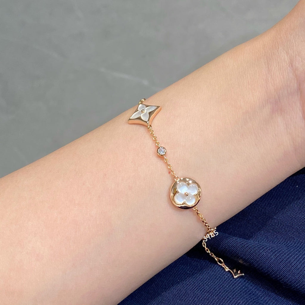 ¡®Star¡¯STAR AND SUN 4 MOTIF WHITE MOP PINK GOLD BRACELET
