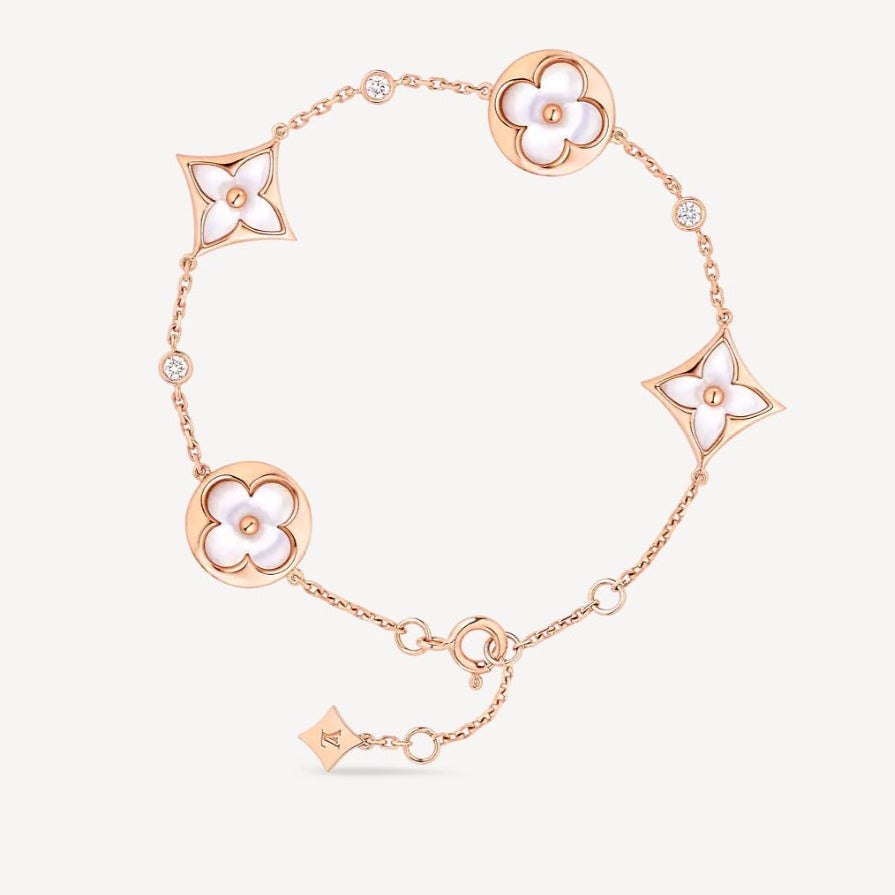 ¡®Star¡¯STAR AND SUN 4 MOTIF WHITE MOP PINK GOLD BRACELET