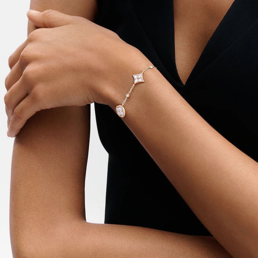¡®Star¡¯STAR AND SUN 4 MOTIF WHITE MOP PINK GOLD BRACELET