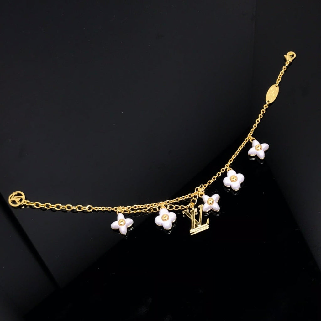 ¡®Star¡¯LOGO 6 MOTIF STAR AND SUN GOLD BRACELET