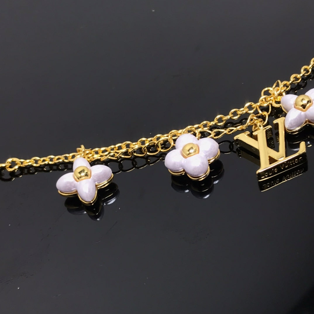 ¡®Star¡¯LOGO 6 MOTIF STAR AND SUN GOLD BRACELET