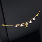 ¡®Star¡¯LOGO 6 MOTIF STAR AND SUN GOLD BRACELET