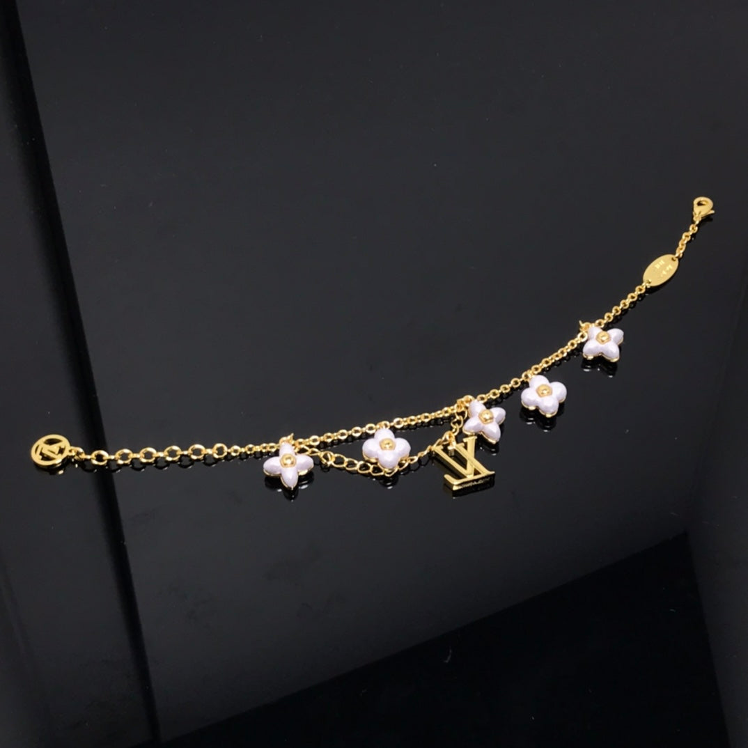 ¡®Star¡¯LOGO 6 MOTIF STAR AND SUN GOLD BRACELET