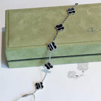 ¡®Star¡¯CLOVER 5 MOTIF VEINED ONYX BRACELET SILVER