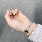 ¡®Star¡¯CLOVER 5 MOTIF VEINED ONYX BRACELET SILVER