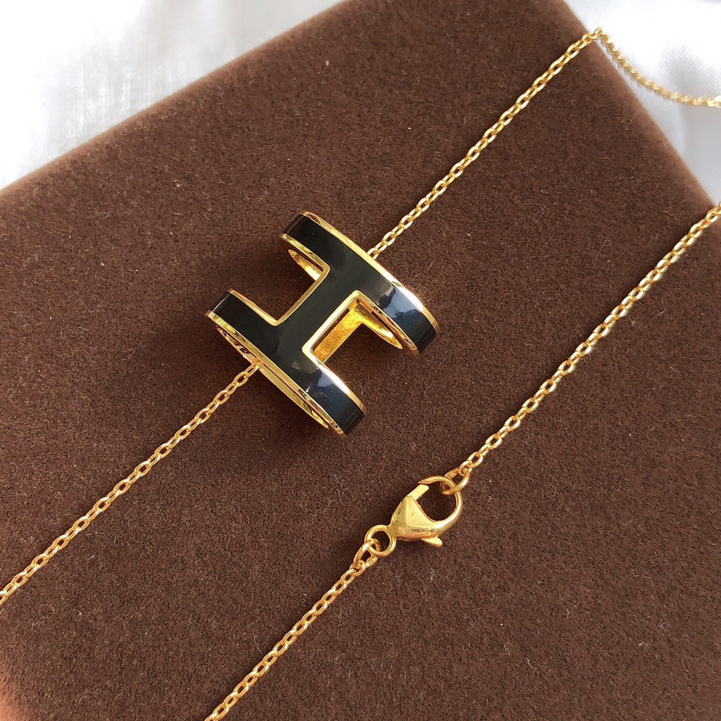 ¡®Star¡¯HM CLIC BLACK ENAMEL GOLD NECKLACE