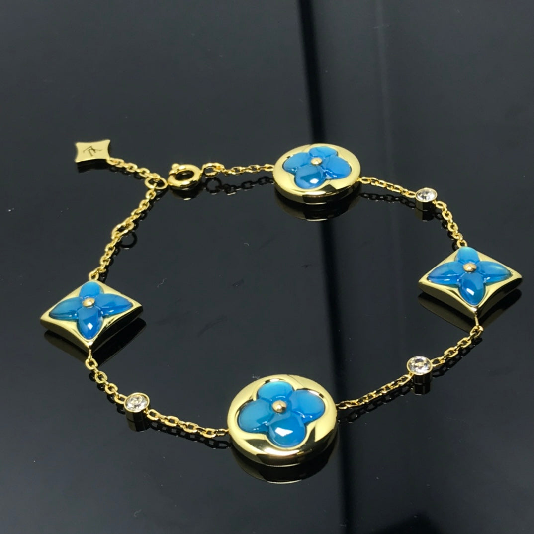 ¡®Star¡¯STAR AND SUN 4 MOTIF BLUE BRACELET
