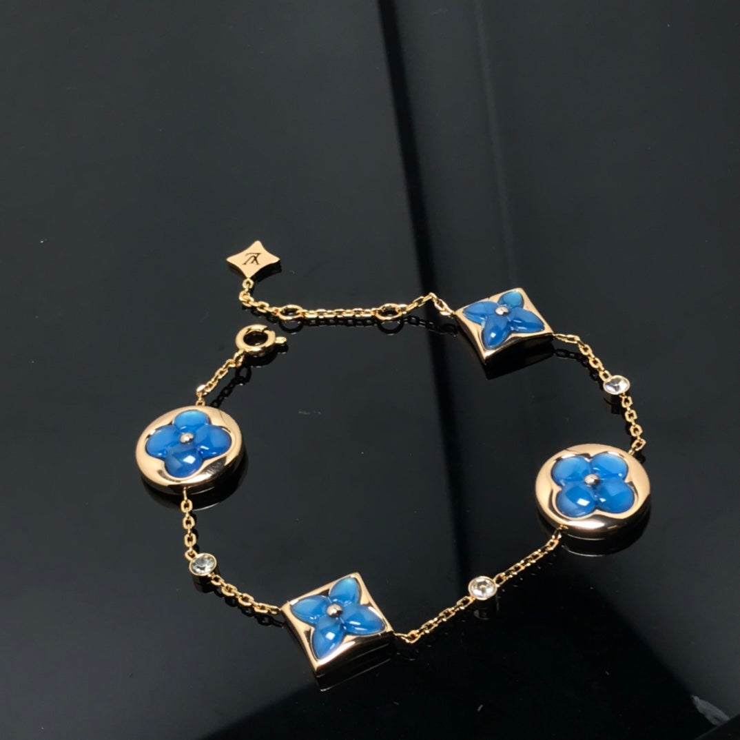 ¡®Star¡¯STAR AND SUN 4 MOTIF BLUE BRACELET