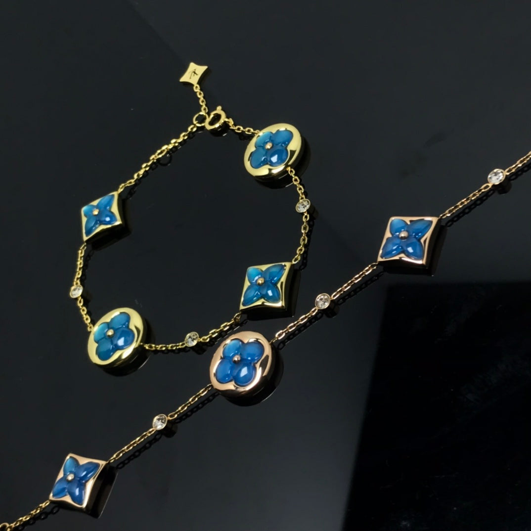 ¡®Star¡¯STAR AND SUN 4 MOTIF BLUE BRACELET
